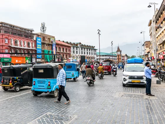 Traffic zips around Srinagar's central plaza, Lal Chowk ("Red Square")