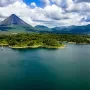 Arenal Volcano National Park, with Arenal Lake in the foreground.